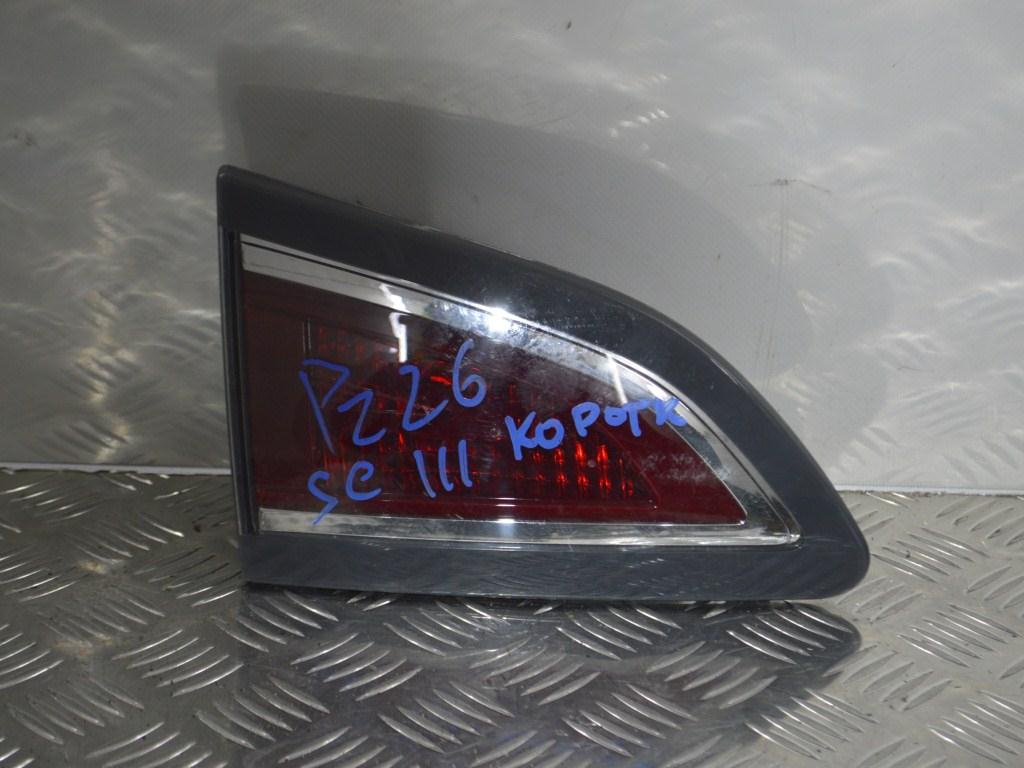 Фонарь крышки багажника левый