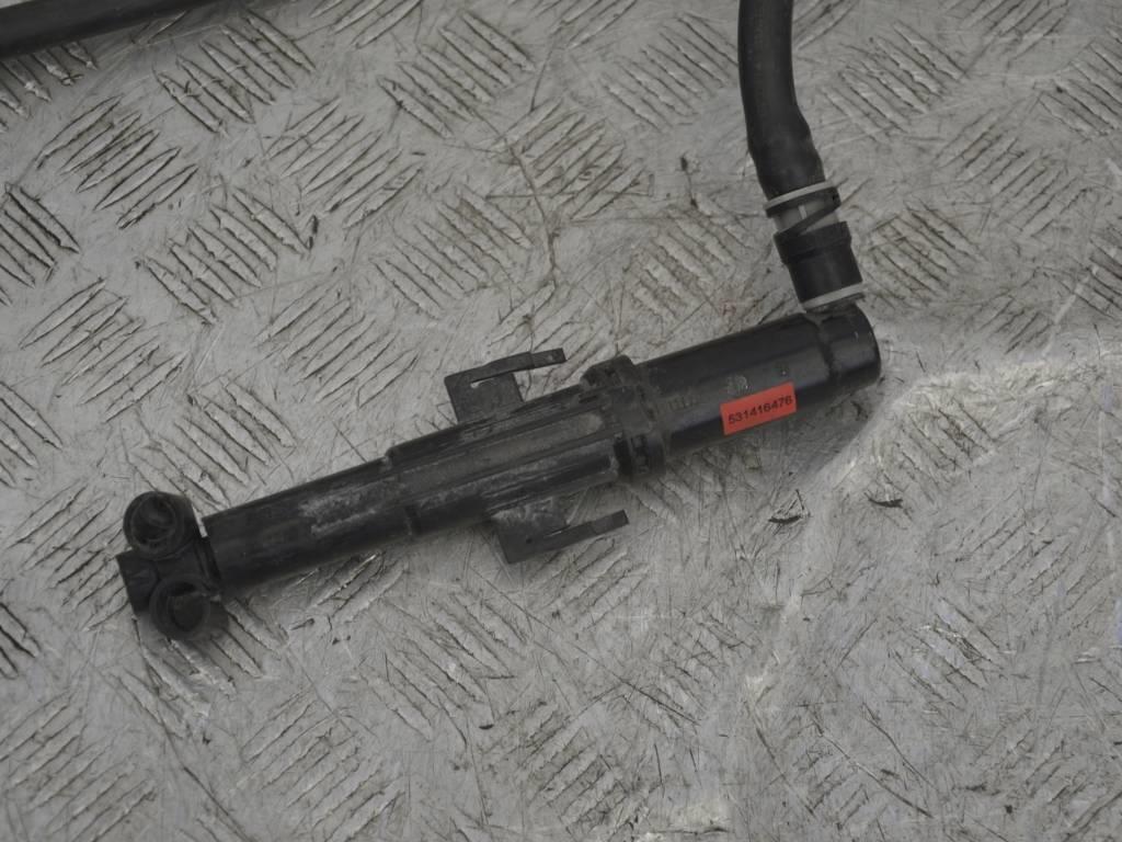 Форсунка омывателя фар