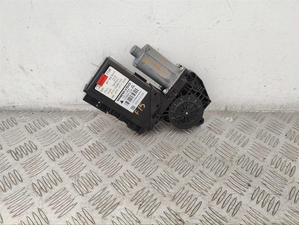 Моторчик стеклоподъемника передний левый