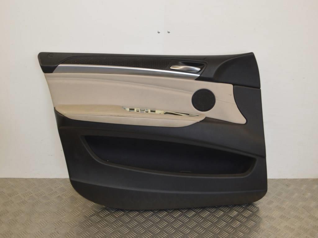 Обшивка двери передней левой (дверная карта)