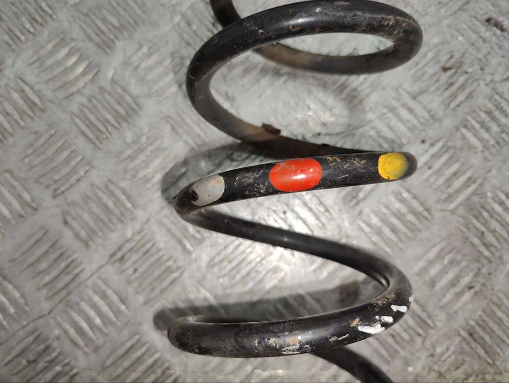 Пружина задняя