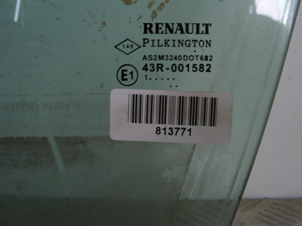 Стекло двери передней левой