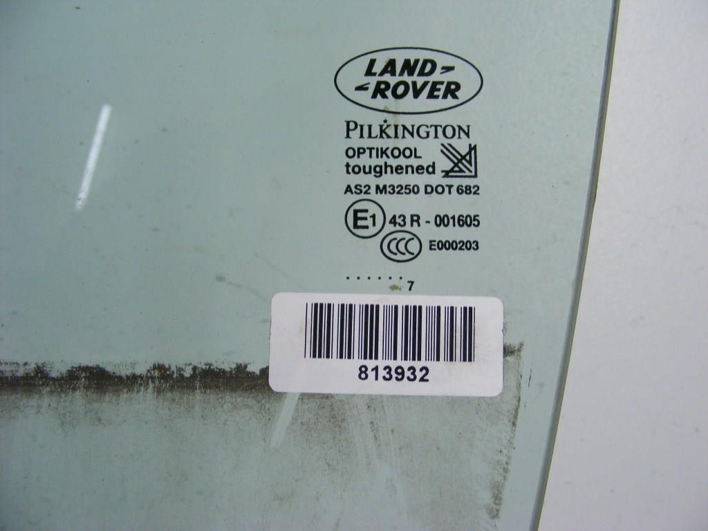 Стекло двери передней левой