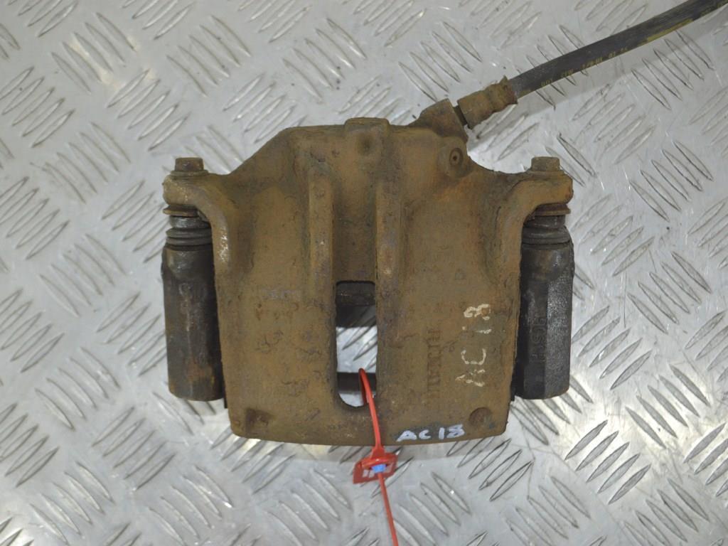 Суппорт передний левый