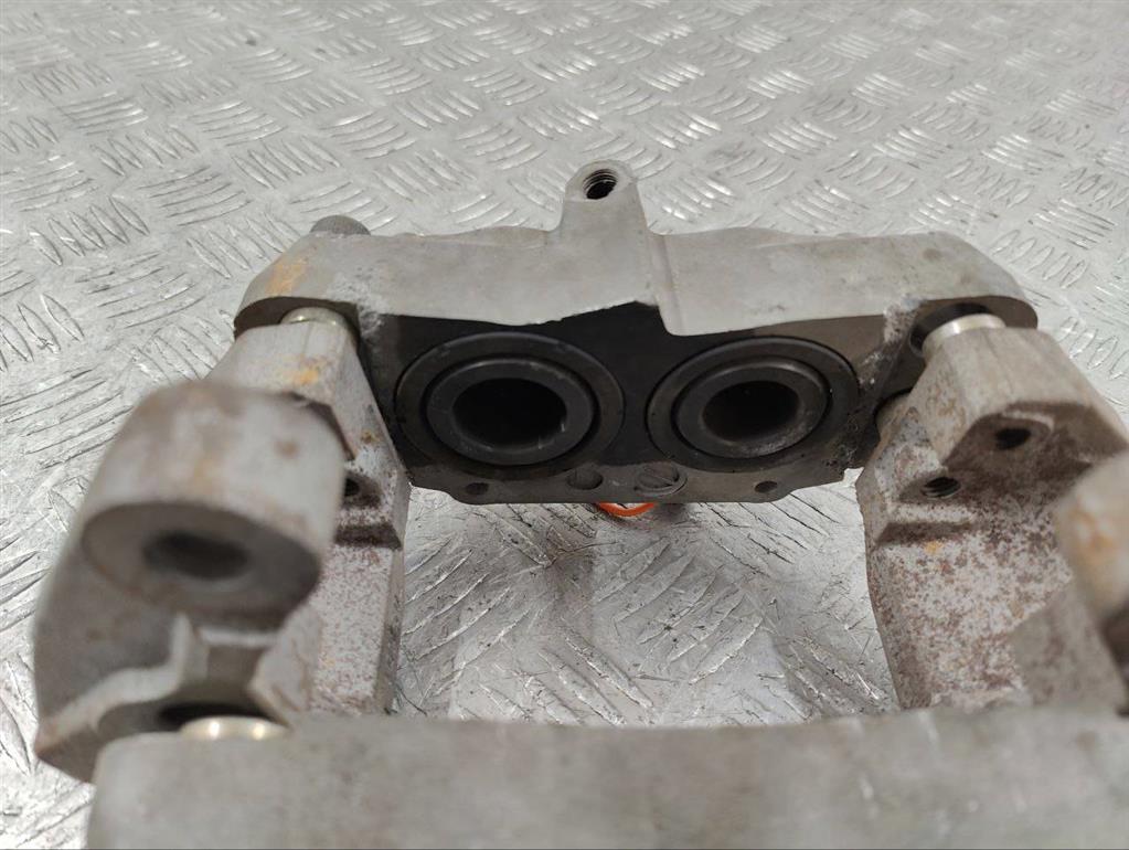 Суппорт передний левый