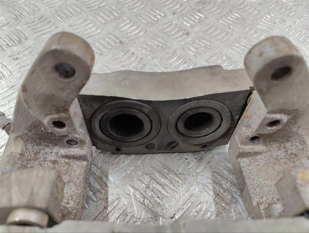 Суппорт передний левый